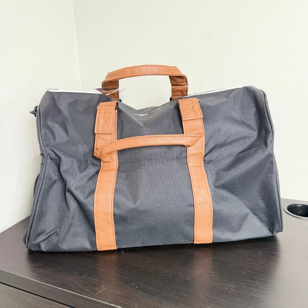 Herschel Supply Co Novel Duffel Bag Black iShares MSCI Corporate Logo NWT